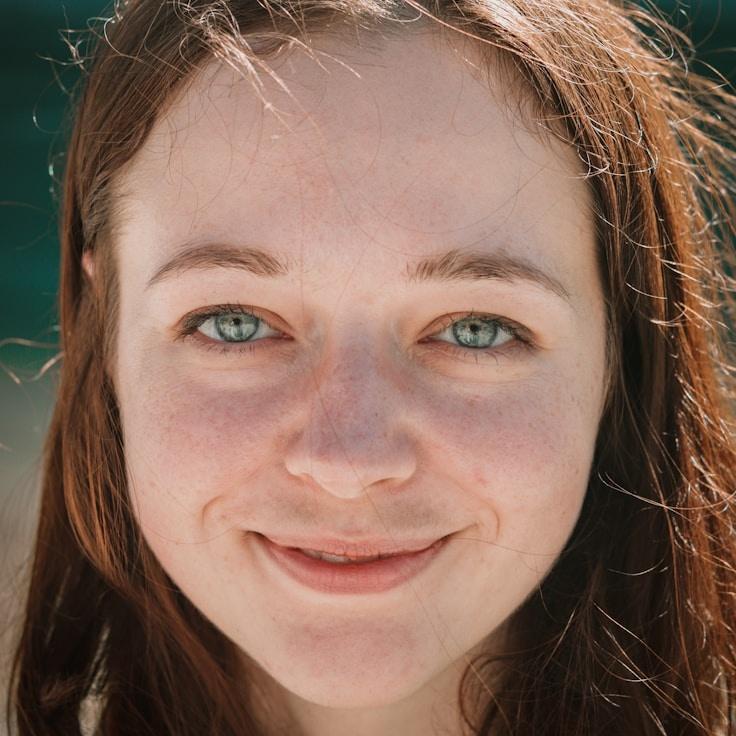Kaveri Mehta, Lead Design Curator at Isle Ledger Market, reviewing corporate floral arrangements